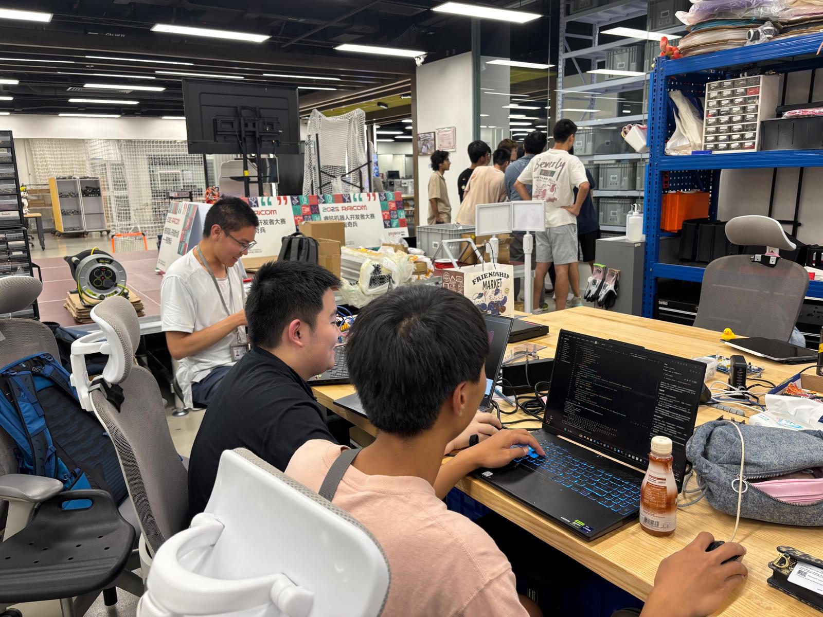 Club members coding together in the robotics lab